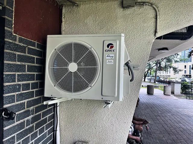 Ductless outdoor unit on a wall bracket