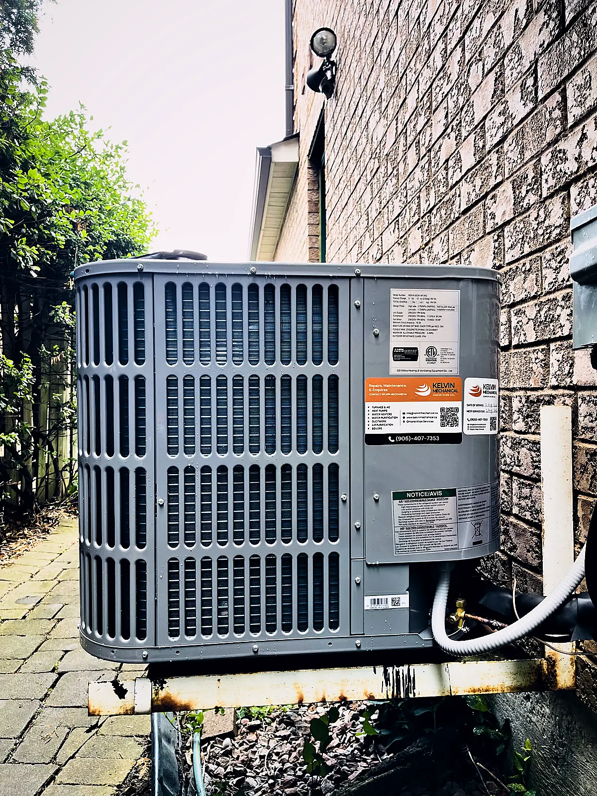 Outdoor air conditioner with service label