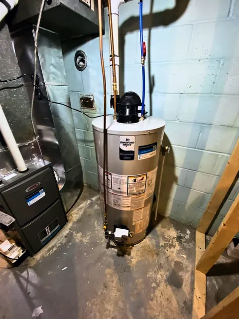 Gas tank water heater installed with shut-offs